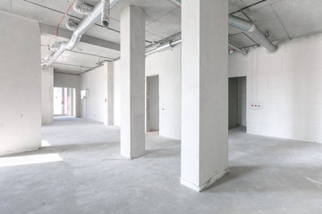 empty pure commercial office building undecorated in gray colors.open space office