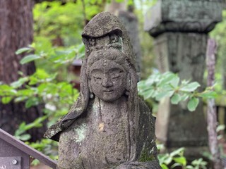 Japanese carving of the bodhisattva Jizo, protector of travelers and children