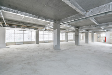 empty pure commercial office building undecorated in gray colors.open space office