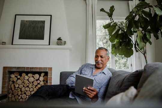 Senior man with a tablet