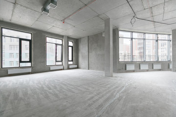 empty pure commercial office building undecorated in gray colors.open space office