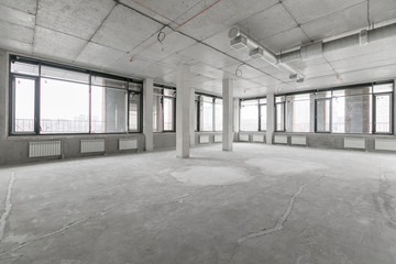 empty pure commercial office building undecorated in gray colors.open space office