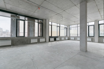 empty pure commercial office building undecorated in gray colors.open space office