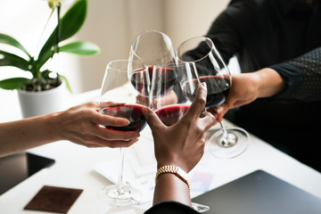 Professional business celebrating with wine