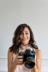 Fototapeta premium Female photographer at a shoot