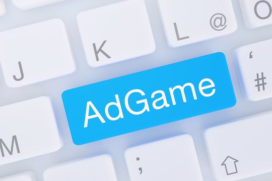 AdGame. Computer Tastatur von oben zeigt Taste mit Wort hervorgehoben. Software, Internet, Programm