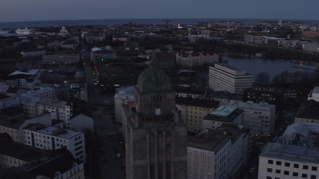 Drone shot rotate around high church dome in city center of Helsinki. Finland.