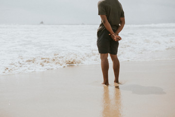 Thoughtful man on the beach