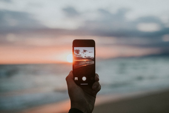 Taking a picture of sunset
