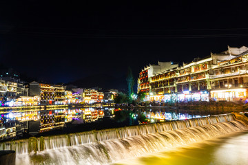 Obraz premium Night scene of phoenix ancient city, xiangxi, China