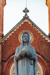 Saigon Notre-Dame Cathedral Basilica (Basilica of Our Lady of The Immaculate Conception) on blue sky background in Ho Chi Minh city, Vietnam. Ho Chi Minh is a popular tourist destination of Asia.