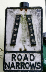 Close-up Of Weathered Road Sign