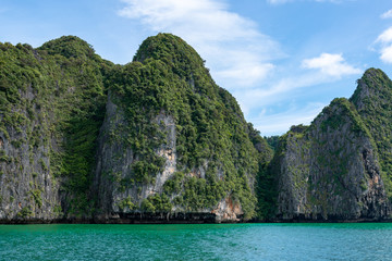 Beautiful landscape of limestone islands and emerald color water in Phang-Nga bay national park near Phuuket Thailand.