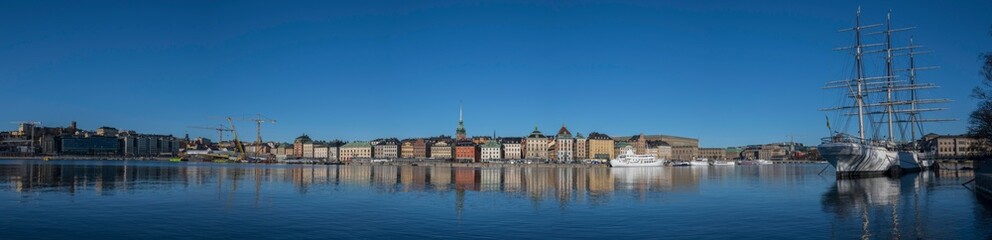 Fototapeta na wymiar Gamla Stan from a crowned bridge a sunny morning in Stockholm.