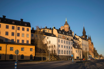 Fototapeta na wymiar Old part of the district Södermalm with houses on a hill side in Stockholm a sunny morning. 