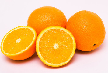Fresh and tasty oranges with white background
