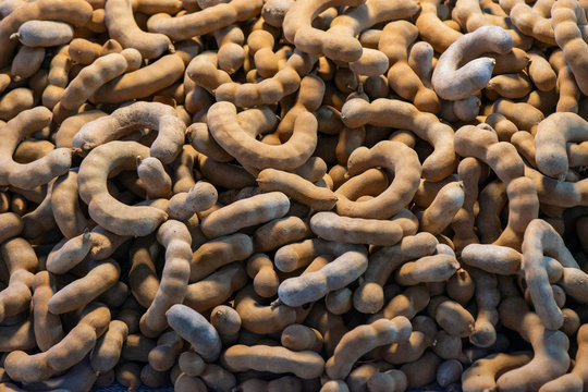 Top view of tamarind fruit (Tamarindus indica) Background in market 