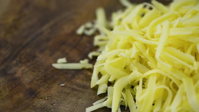 Portion of grated Cheese (seamless loopable; 4K)