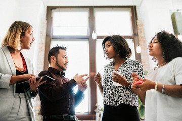 Team working on and discussing a new project