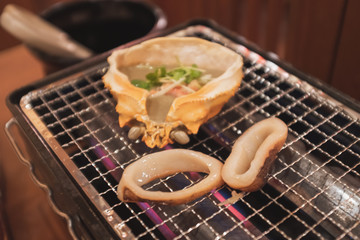 Seafood is very popular with tourists who like grilled food when visiting Japan.