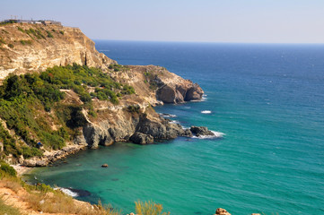 The rocky shore of the island