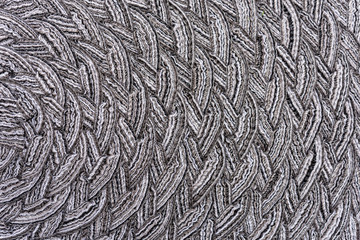 Seamless close up of monochrome grey carpet texture background from above.