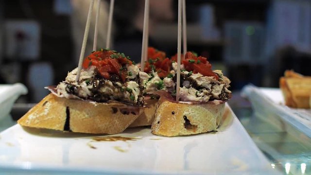 Tapas traditional Spanish sandwiches starters in a cafe in Barcelona