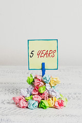 Conceptual hand writing showing 5 Years. Concept meaning Remembering or honoring special day for...