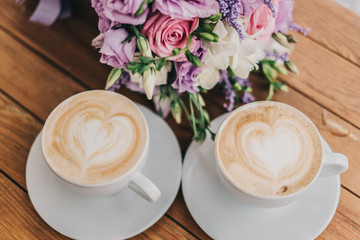 cup of coffee with flowers