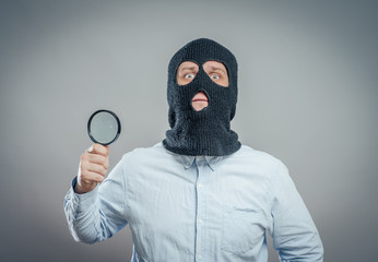 Man Wearing Mask and magnifier