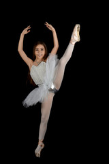 girl dancing with white tutu on black background