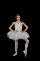 girl dancing with white tutu on black background