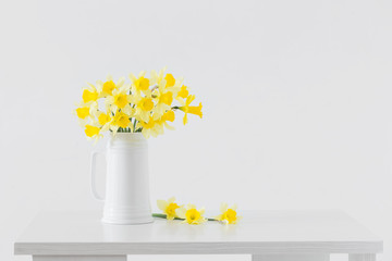 yellow spring flowers on white background