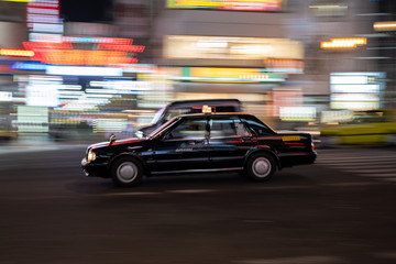 Traffic in Namba, Osaka. Taxi in Motion