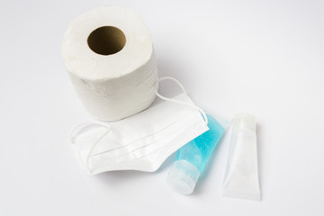 Coronavirus corona virus prevention travel surgical masks, hand sanitizer gel and tissue for hand hygiene spread protection.