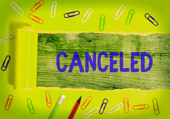 Writing note showing Canceled. Business concept for to decide not to conduct or perform something...