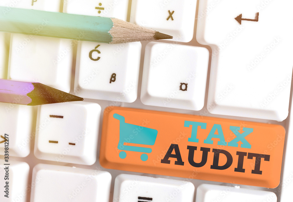 Poster writing note showing tax audit. business concept for examination or verification of a business or in