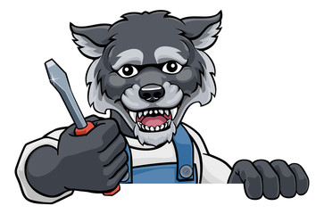 A wolf electrician, handyman or mechanic holding a screwdriver and peeking round a sign