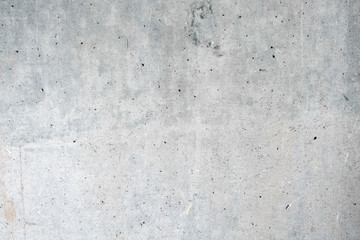 Gray concrete wall. The background of the old wall is light gray.