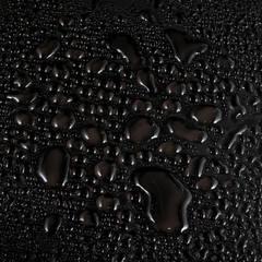 Water drops on black background