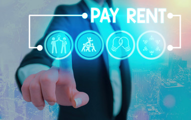 Conceptual hand writing showing Pay Rent. Concept meaning To pay money in exchange for the use of...