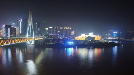 Panorama of Chongqing shrouded in smog at night, China.
