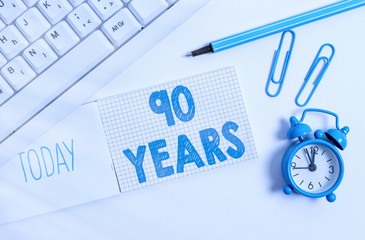 Writing note showing 90 Years. Business concept for Remembering or honoring special day for being...
