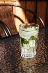 Cucumber mojito with mint and ice. Detox smoothie, summer cold drink.