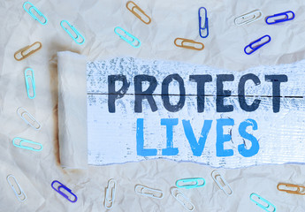 Conceptual hand writing showing Protect Lives. Concept meaning to cover or shield from exposure...