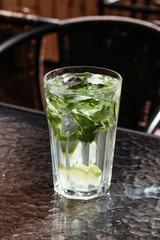Cucumber mojito with mint and ice. Detox smoothie, summer cold drink.