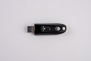 Black usb flash drive isolated on the white background