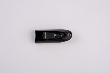 Black usb flash drive isolated on the white background