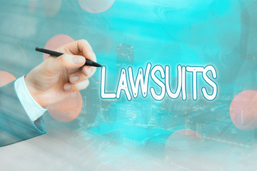 Conceptual hand writing showing Lawsuits. Concept meaning a claim or dispute brought to a law court...