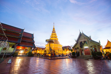 golden pagoda on sunset day